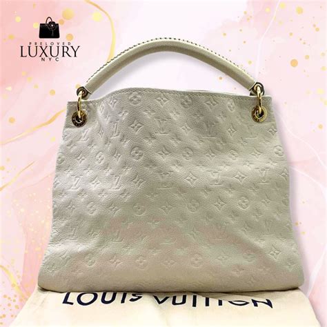 sac louis vuitton cylindrique|Louis Vuitton empreinte bag.